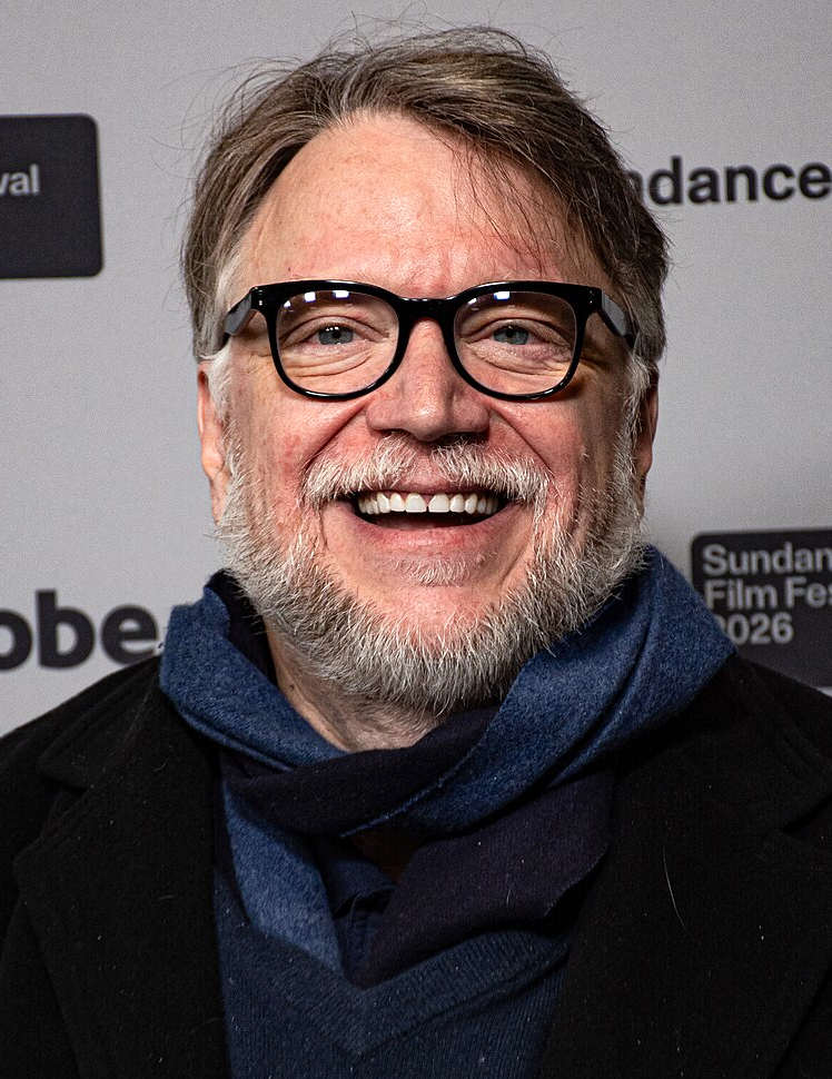 Guillermo del Toro G�mez (born 9 October 1964) is a Mexican filmmaker, author, and artist. His work has been characterized by a strong connection to fairy tales, gothicism, and horror, often blending the genres, with an effort to infuse visual or poetic beauty in the grotesque. He has had a lifelong fascination with monsters, which he considers symbols of great power. del Toro is known for pioneering dark fantasy in the film industry and for his use of insectile and religious imagery, his themes of Catholicism, celebrating imperfection, underworld motifs, practical special effects, and dominant amber lighting.